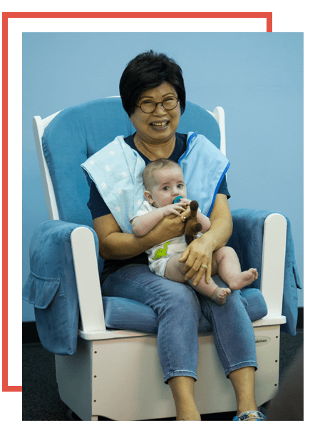 Volunteer Holding Baby